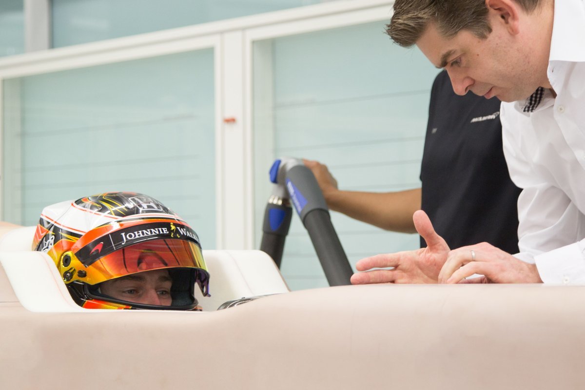 Stoffel Vandoorne tries the view from 2017 car in the McLaren factory